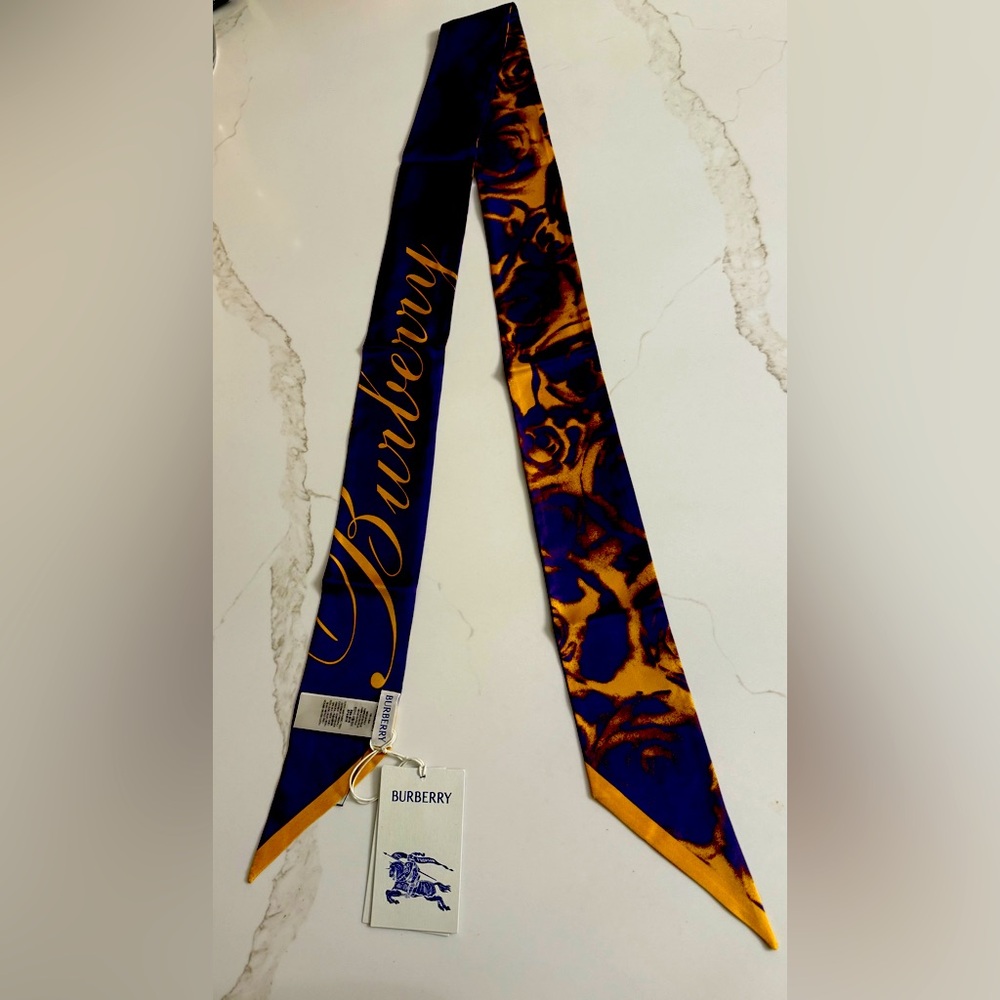Burberry,‎ new with tags and gift box 100% silk scarf, purple and gold